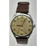 AN VINTAGE OMEGA AUTOMATIC WITH SECOND SUB DIAL, ON LEATHER STRAP 35mm