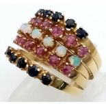 A very unusual 14 K yellow gold five band hinged ring with opals, rubies and sapphires. Ring size:
