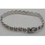 A 9 K white gold fancy link bracelet. Weight: 8.2 g.