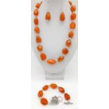 A vintage, Tibetan silver, large faceted carnelian beaded necklace, bracelet and earrings set.