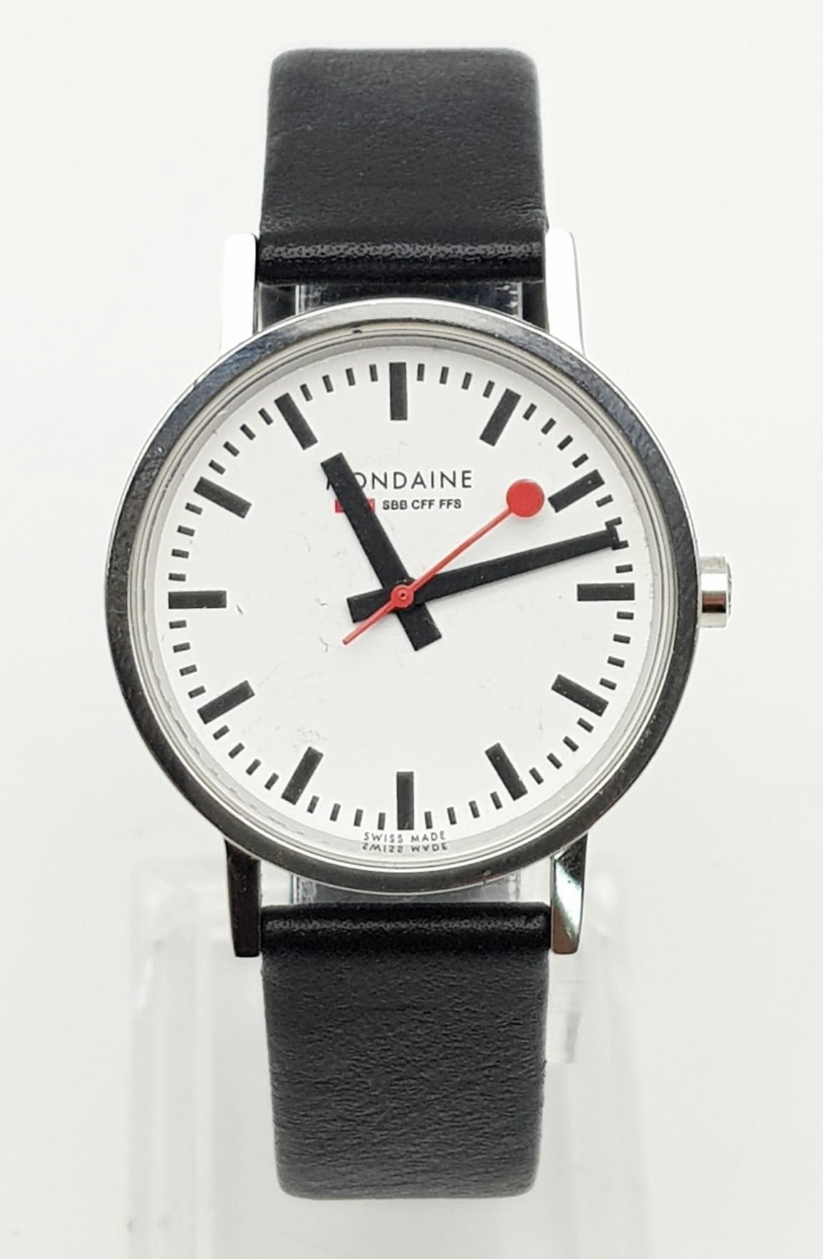 A Vintage Mondaine Railway Watch. Black leather strap. Stainless steel case - 32mm. Quartz movement.