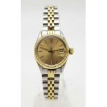 A ROLEX OYSTER PERPETUAL DATE WATCH IN BI-METAL WITH GOLDTONE FACE . 25mm