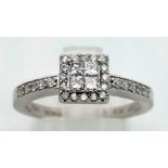 An 18 K white gold diamond cluster ring. Diamonds 0.38 carats, Ring size: n, total weight: 3.7 g.