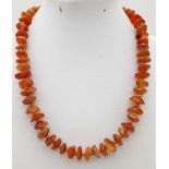 A Vintage Rough Amber Beaded Necklace. 42cm