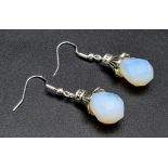 A Pair of White Jade Bead Earrings.