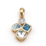 A 9 K yellow gold pendant with diamond and topaz. Length: 16 mm, weight: 1.1 g.