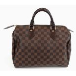 A Louis Vuitton Checked Canvas Speedy Bag. Red cloth interior with flap pocket. 30 x 25cm. In very