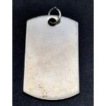 A sterling silver dog tag. Dimensions: 45 x 25 mm, weight: 18.3 g.
