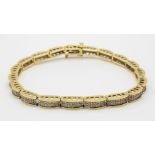 An 18 K yellow gold diamond (1.20 carats) bracelet. total weight: 19.2 g.