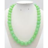 A Vintage Lime-Green Jade Bead Necklace. Lovely 14mm beads with a gilded barrel clasp. 46cm