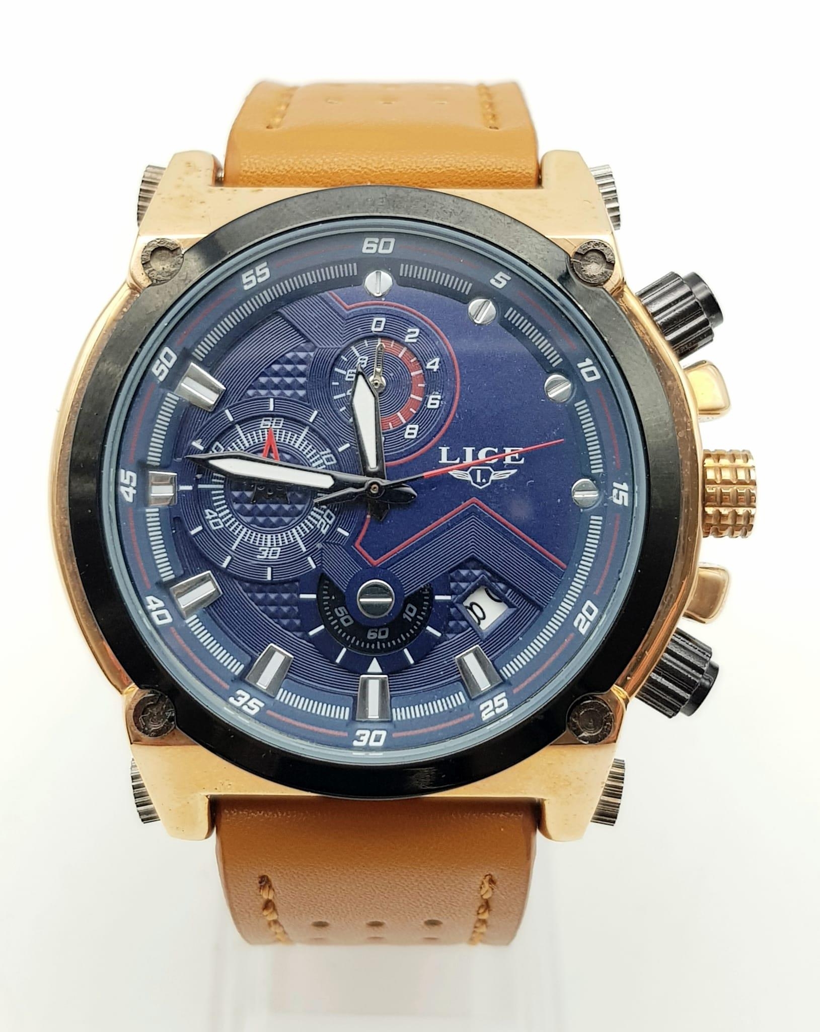 A Lige Chronograph Watch. Brown leather strap. Gilded case - 48mm. Quartz movement, in good