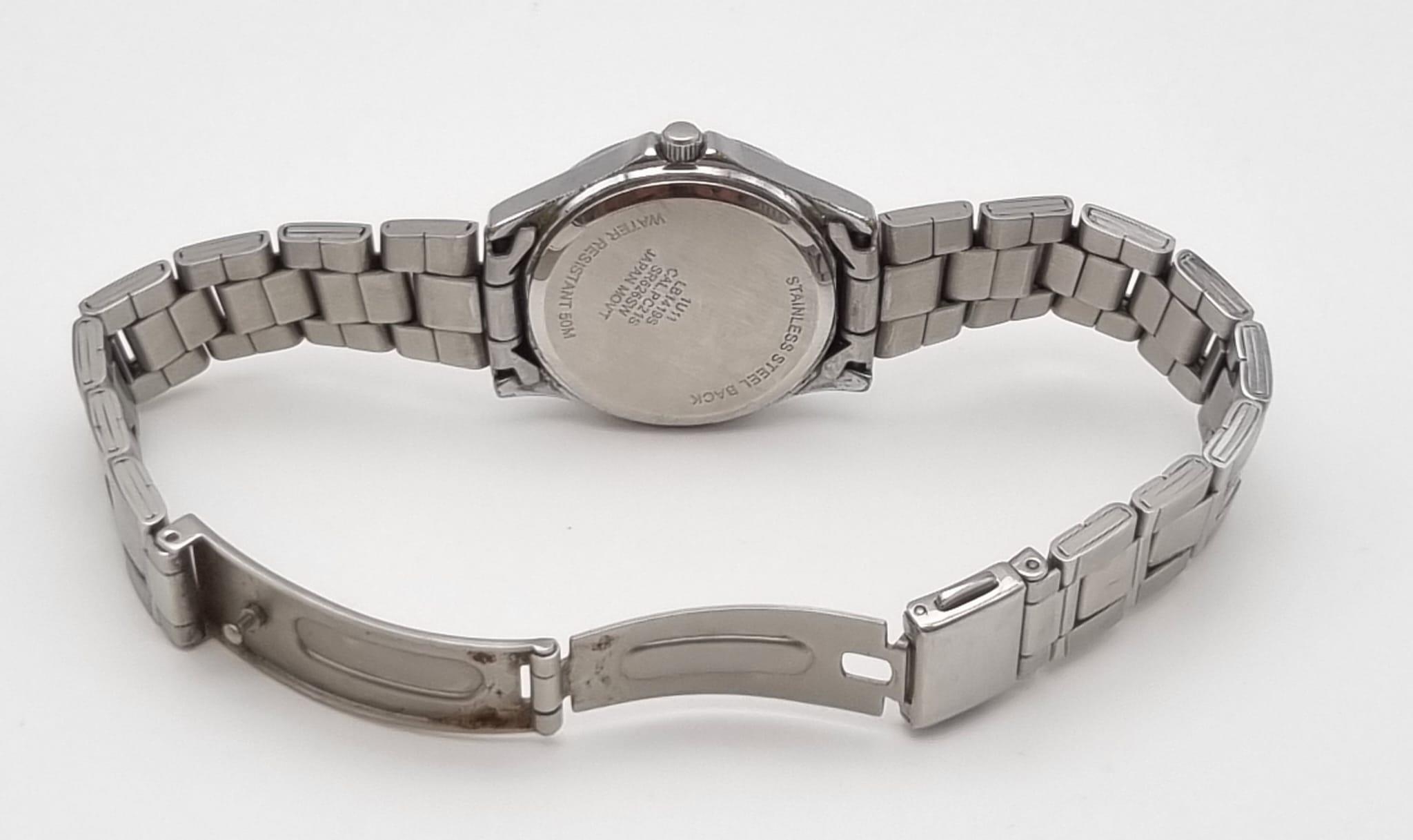 A Quality Accurist Ladies Diamonte Watch. Stainless steel strap and case - 28mm. Silver tone dial. - Image 7 of 10