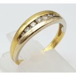 An 18 K yellow gold band ring with diamonds. Size: M, weight: 3.3 g.