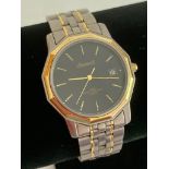 Gentlemans INGERSOLL quartz wristwatch,Black face model, 12 side gold plated bezel with two tone