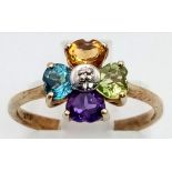 A Vintage 9K Yellow Gold Multi-Gemstone Heart Ring. Four heart-cut stones comprising of :