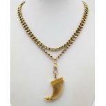 An Antique Tiger Claw Set in 18K Yellow Gold - Presented on an Antique 9K Gold Albert Chain.