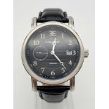 A Thomas Earnshaw Automatic Gents Watch. Black leather strap and stainless steel case - 40mm.