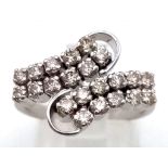 A 14K WHITE GOLD DOUBLE ROW DIAMOND CROSSOVER RING .4.3gms size N