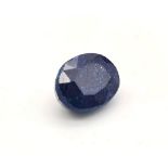 A 8.80ct Blue Sapphire (Composite). Oval cut. Comes with a certificate.