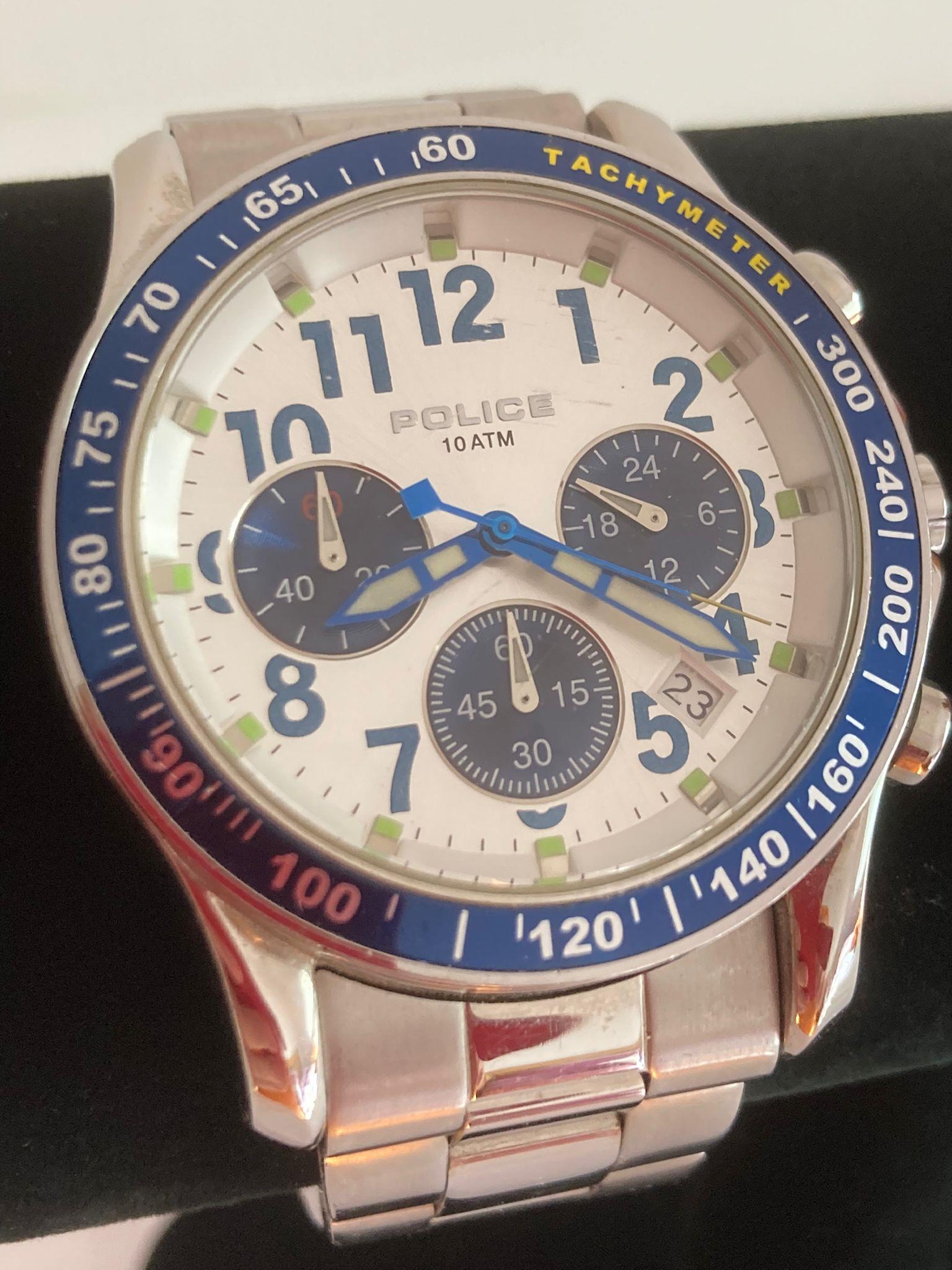 POLICE CHRONOGRAPH TACHYMETER Multi dial model in blue and silver tones with numbered bezel.