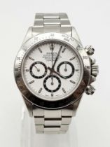 A ROLEX DAYTONA IN THE BEST COLOUR COMBINATION , WHITE FACE WITH 3 SUB DIALS, VERY NICE CONDITION
