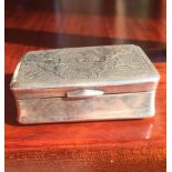 Antique Chinese Or Japanese Style Solid Silver Carved Pill Box or Snuff Box. It is beautifully
