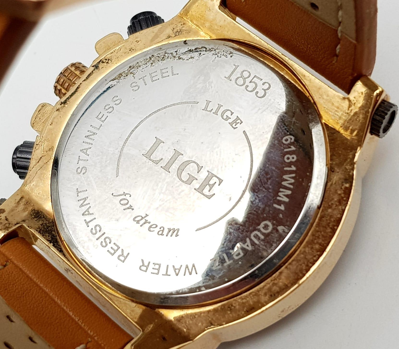 A Lige Chronograph Watch. Brown leather strap. Gilded case - 48mm. Quartz movement, in good - Bild 4 aus 5