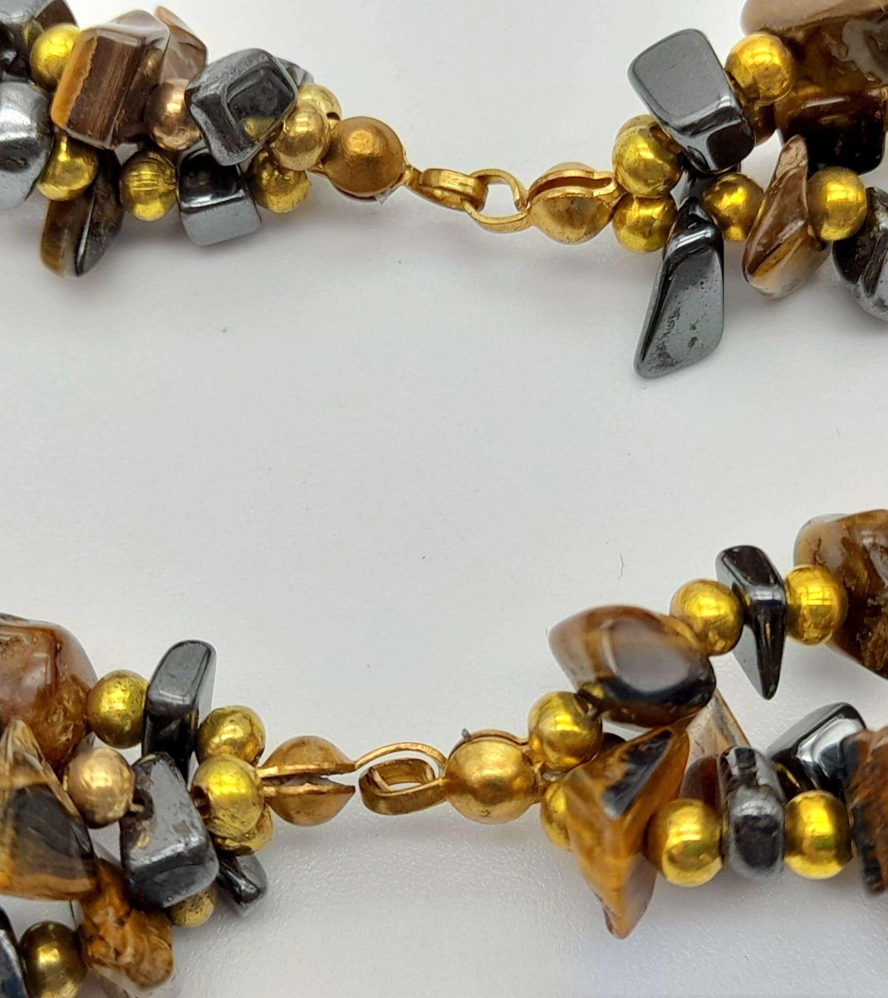 A Three Strand Rough Tigers Eye Bead Necklace. 60cm. - Image 4 of 4