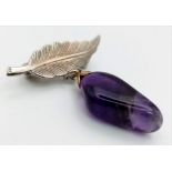 A Vintage Rough Amethyst Arrow Brooch. 3 x 3cm.