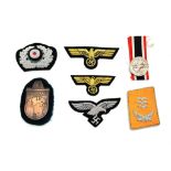 A Parcel of 8 Most Likely Retrospective Copies of Nazi WW2 German Cloth and Metal Badges and