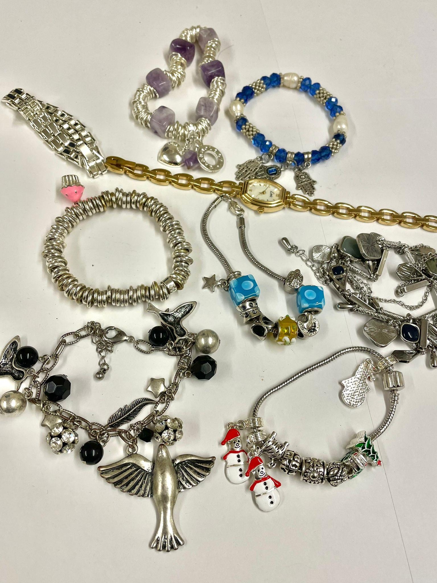 Vintage wristwatch and charm bracelets with 925 charms