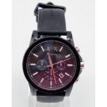 An Armani Exchange Chronograph Gents Watch. Black rubber strap. Case - 44mm. Black dial with three