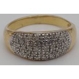 A 9 K yellow gold ring with five rows of diamonds (0.50 carats). size: R, weight: e g.
