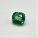 A 30ct Oval Cut Emerald-Green Coloured Gemstone. No certificate so as found. 16 x 16mm