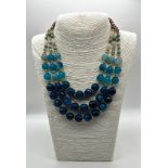 A Three-Row Shades of Blue Faceted Agate Necklace with Multi-Coloured Cultured High Lustre Seed