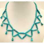 A Turquoise Tube Bead Choker Necklace. 36cm