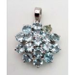 Rare Blue Topaz Pendant. In an elegant floral design. In 925 Sterling silver. 8g. 25mm.