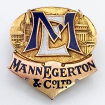 A Solid 9K Yellow Gold Mann Egerton Employee Badge. 8.37g