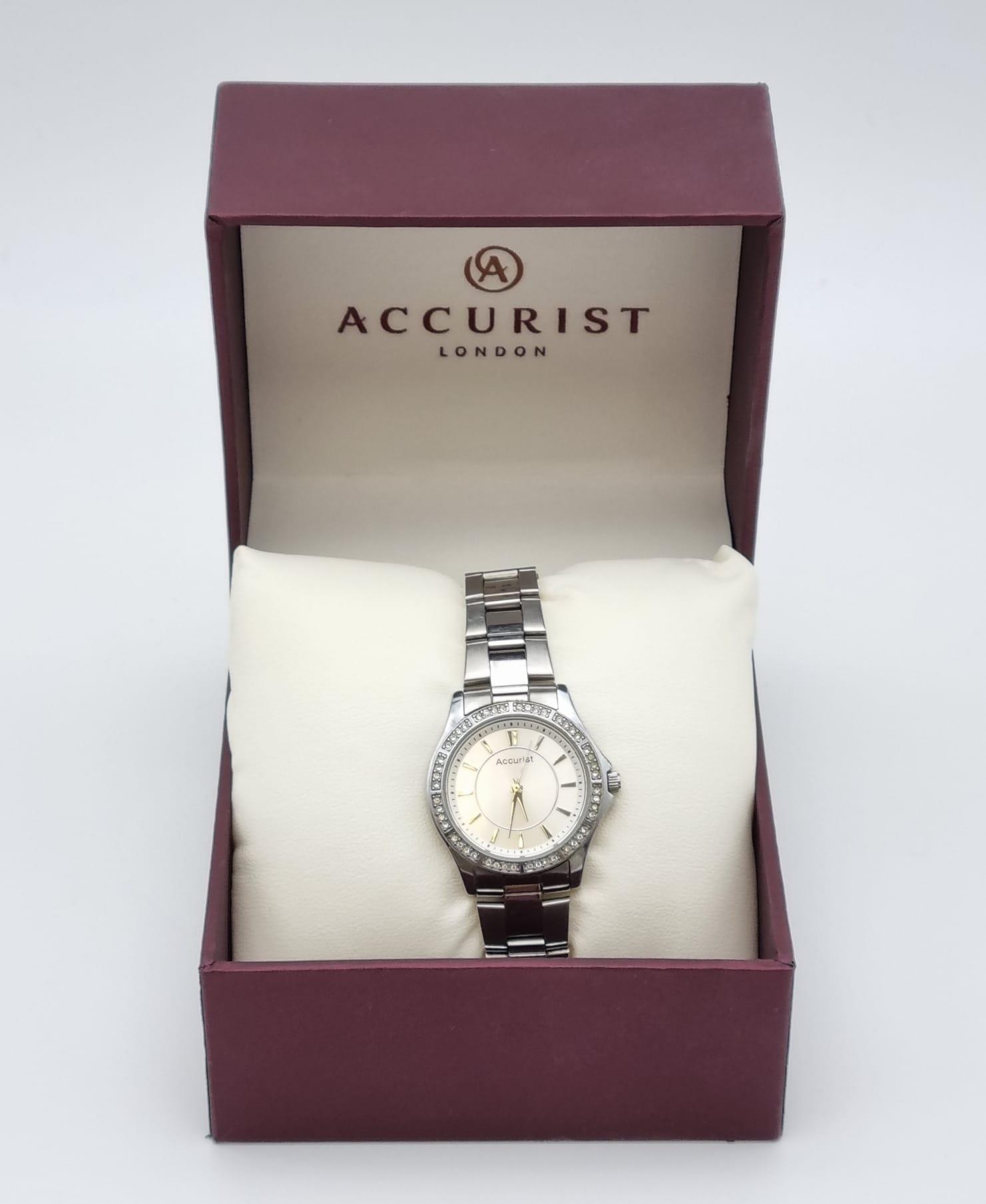 A Quality Accurist Ladies Diamonte Watch. Stainless steel strap and case - 28mm. Silver tone dial. - Image 10 of 10