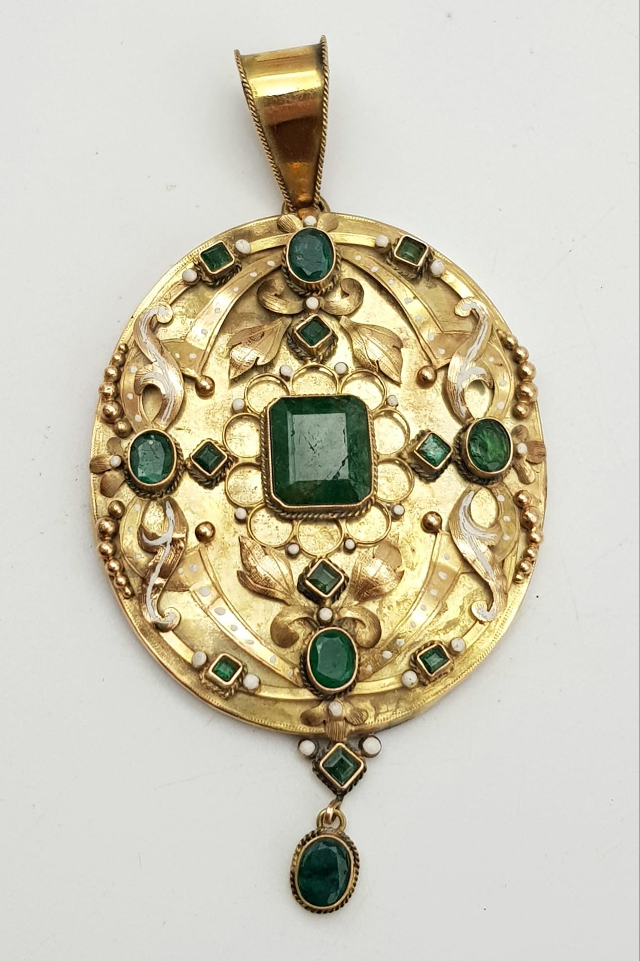 AN ANTIQUE 18K GOLD PENDANT DECORATED WITH JADE AND SEED PEARLS. 15.6gms 8cms