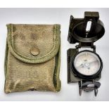 A Vintage 1981 US Military Field Compass in Canvas Belt Case Marked US. Maker Name is Stocker and