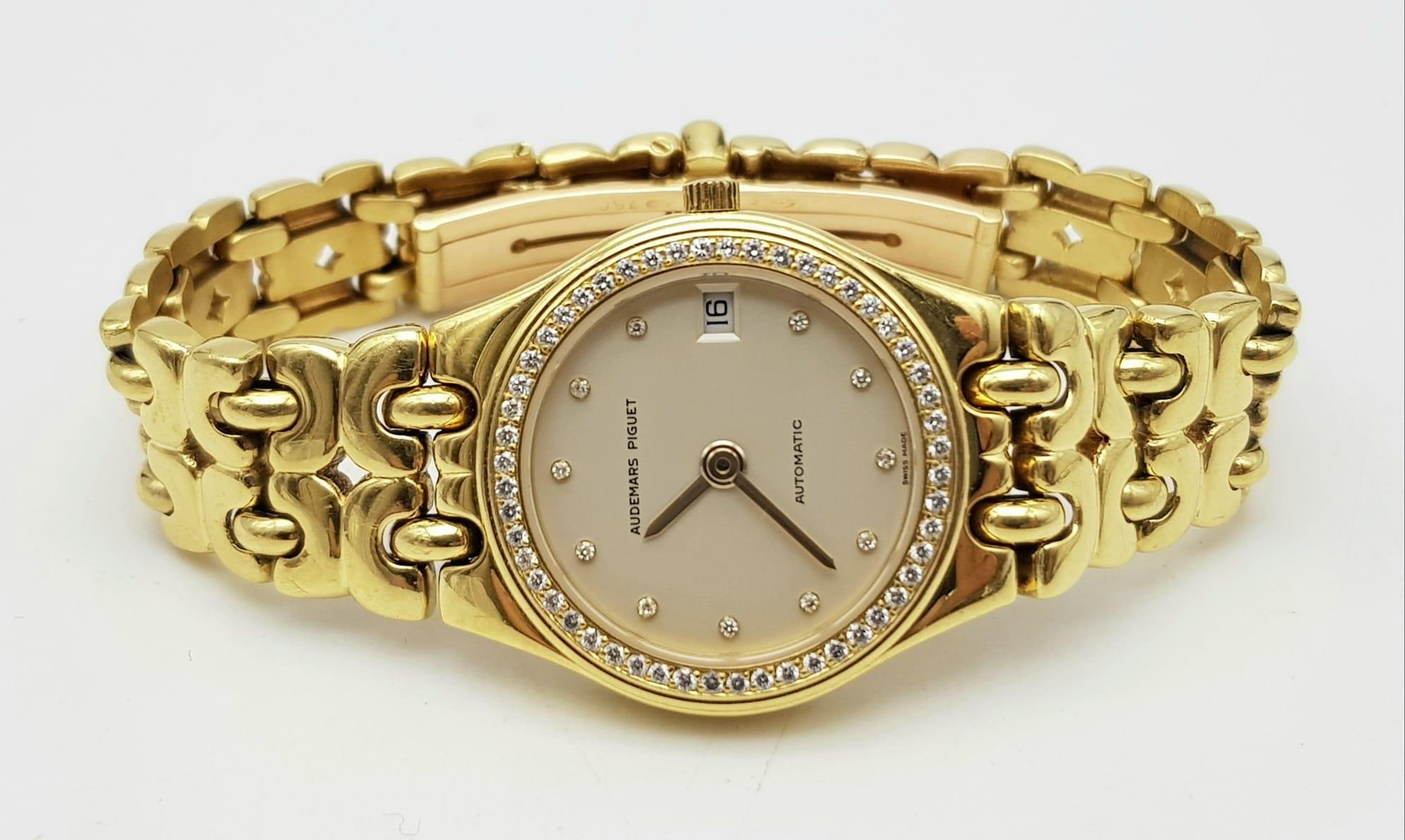 AN AUDEMARS PIGUET GOLD AND DIAMOND LADIES WATCH WITH DIAMOND NUMERALS AND BEZEL, SOLID 18K GOLD