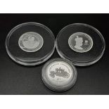 Three Uncirculated Sterling Silver Pound Coins with Certificates.