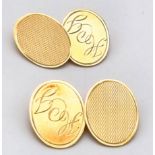 A 9 K yellow gold pair of oval cufflinks. Weight: 5.6 g.