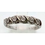 A 9K White Gold Diamond Half-Eternity Ring. Five small round-cut diamonds. Size N. 2.25g.