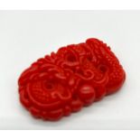 A Red Coloured Dragon Jade Pendant. 5cm
