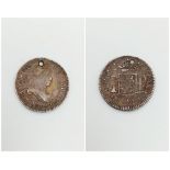 An 1814 Spanish Guatemala One Reale Coin. Please see photos for conditions.