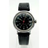 A Vintage Timex 24hr Mechanical Watch. Black leather strap. Case - 30mm. Black dial with date