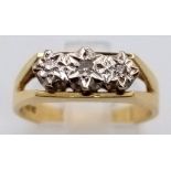 AN 18K GOLD 3 DIAMOND RING. 4.8gms size N