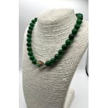 A Green Malachite, Jade and Fresh Water Coin Pearl Necklace. A cultured freshwater white coin